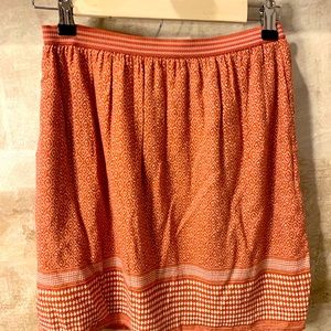 Super cute flowy lined pull on skirt.